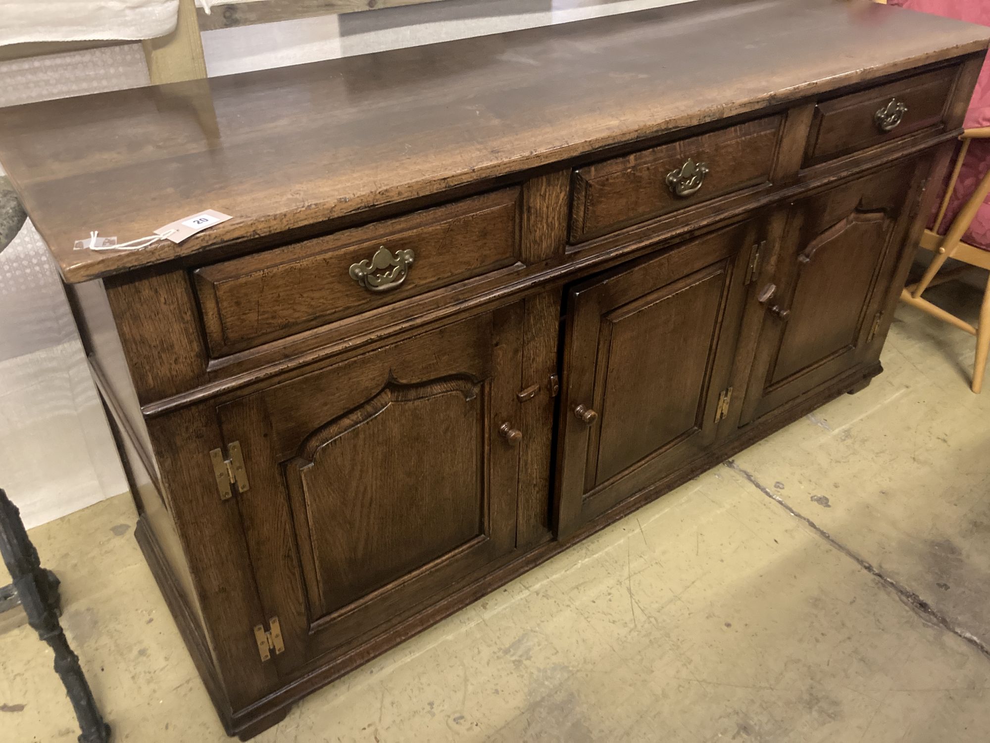 A Georgian style oak dresser base, width 170cm depth 53cm height 84cm